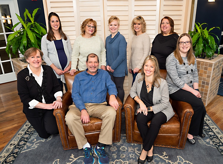Lancaster dentists and dental team members sitting in dental office reception area