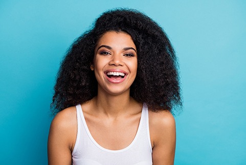 Woman smiling after treatment