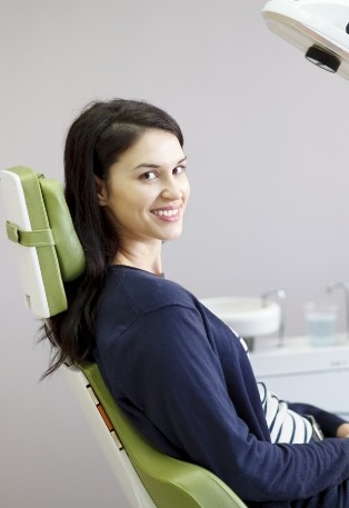 Woman smiling during preventive dentistry visit