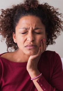 a woman with a hurt tooth near East Petersburg