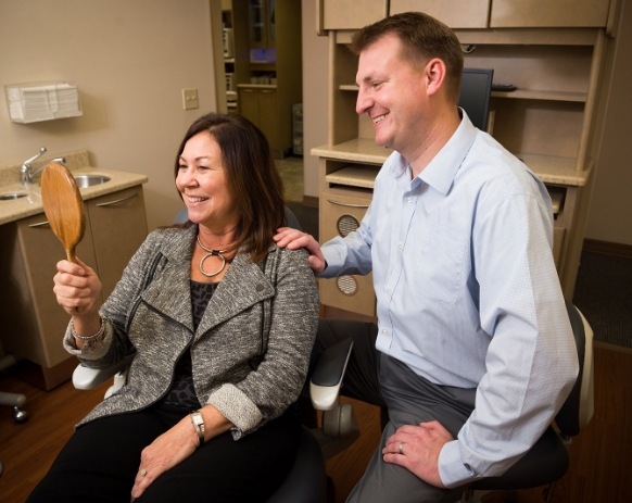 Doctor Herres and dental patient in dental office