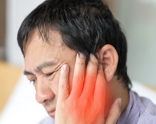 A man with jaw pain